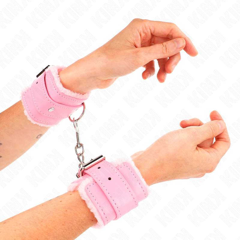 KINK - FUR LINED WRIST RESTRAINTS PINK WITH PINK BELT ADJUSTABLE 17-29 CM X 6 CM KINK - FUR LINED WRIST RESTRAINTS PINK WITH PINK BELT ADJUSTABLE 17-29 CM X 6 CM
