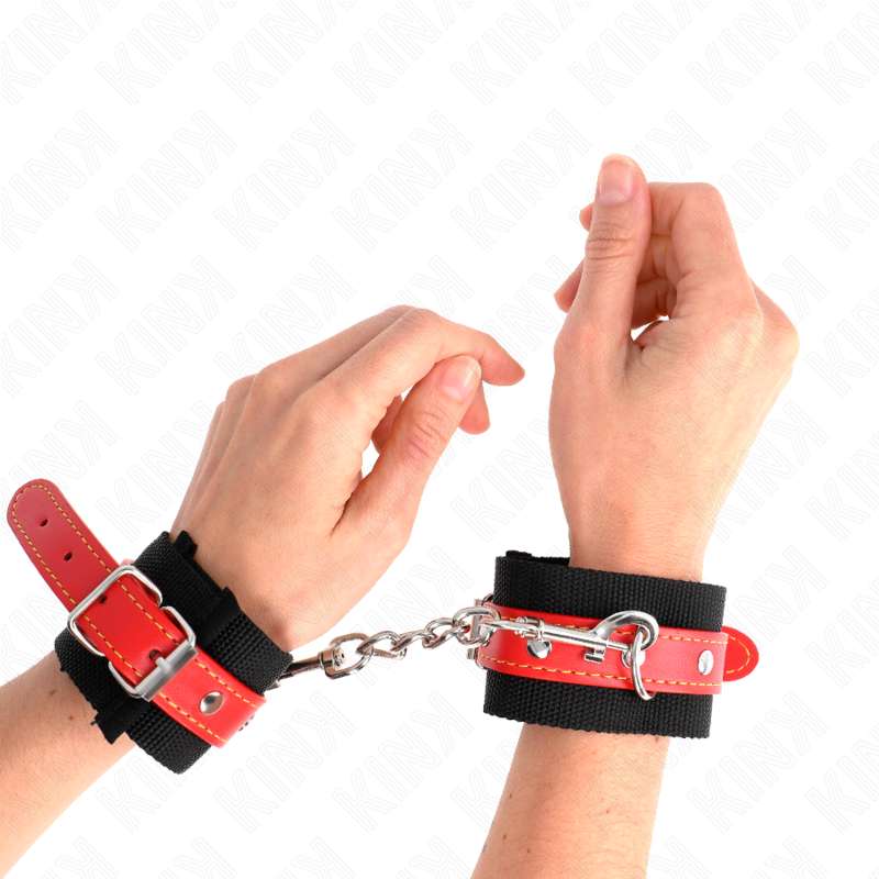 KINK - NYLON WRIST RESTRAINTS BLACK WITH LEATHERETTE RED ADJUSTABLE 19-24 CM X 5.5 CM KINK - NYLON WRIST RESTRAINTS BLACK WITH LEATHERETTE RED ADJUSTABLE 19-24 CM X 5.5 CM